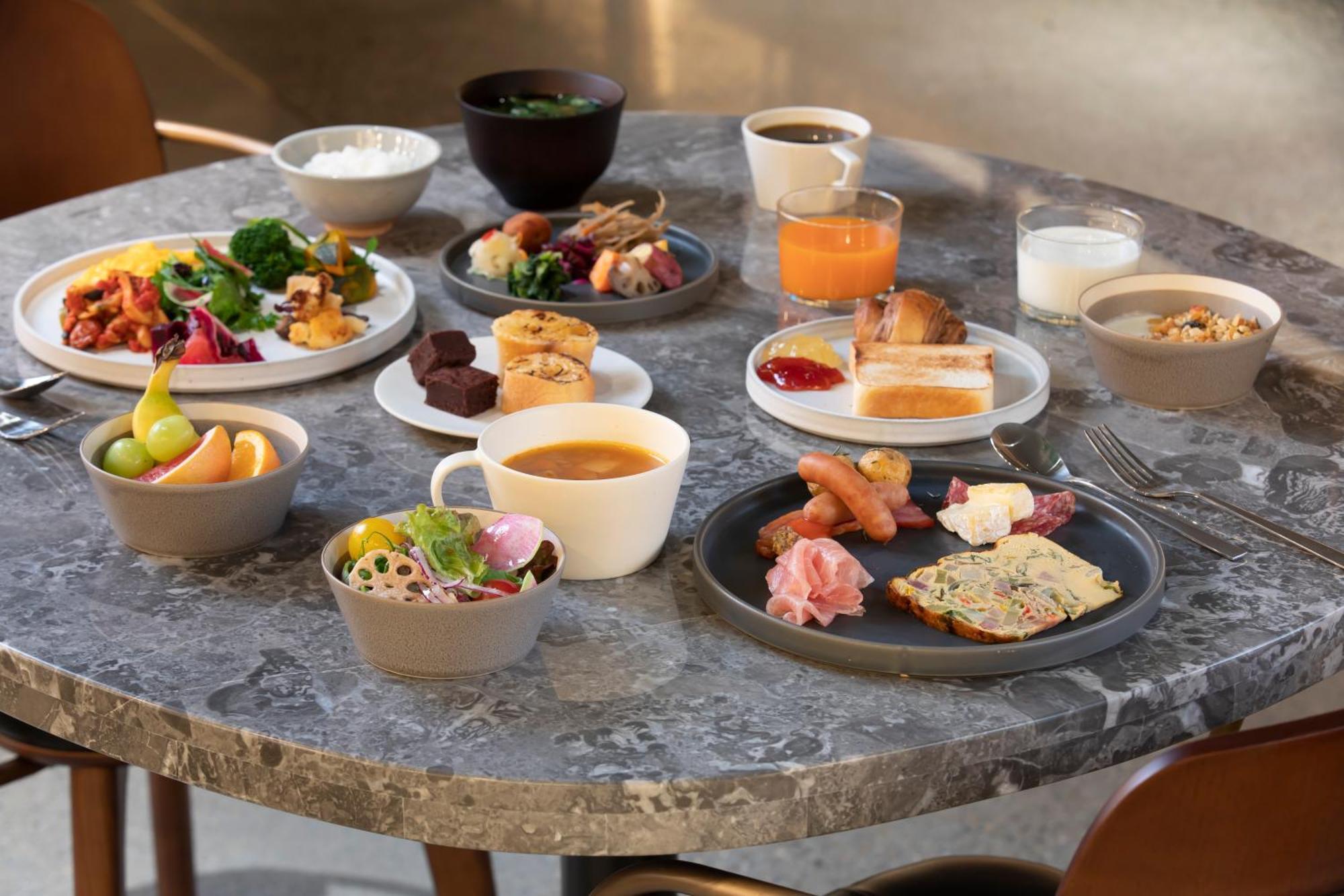 Good Nature Hotel Kioto Exterior foto A breakfast buffet at a hotel